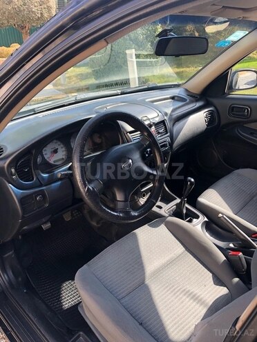 Nissan Sunny 2006, 260,000 km - 1.3 l - Bakı