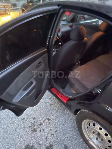 Kia Rio 2009, 450,000 km - 1.4 l - Bakı