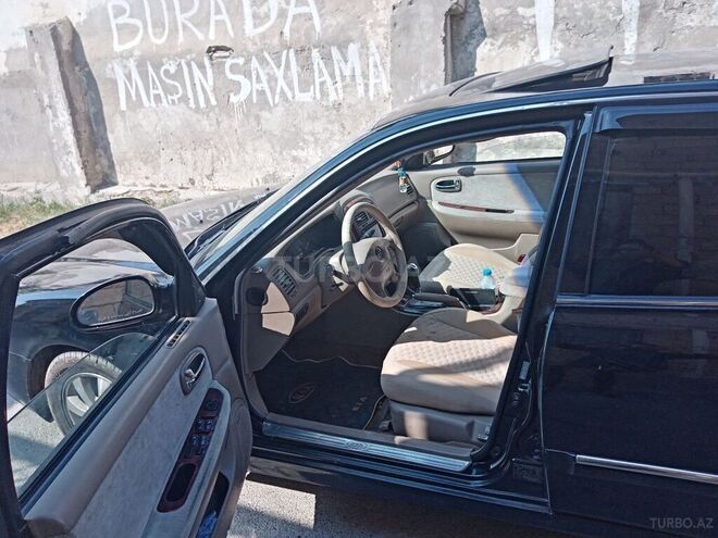 Kia Optima 2003, 140,000 km - 2.7 l - Bakı
