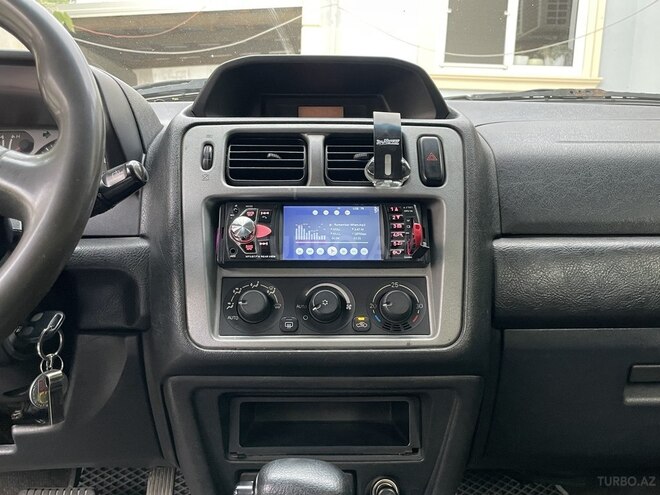 Mitsubishi Pajero io 2001, 284,709 km - 2.0 l - Bakı