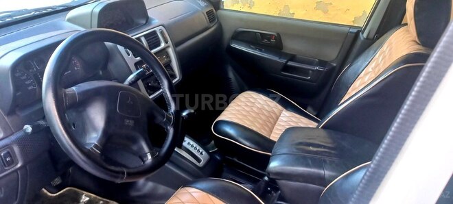 Mitsubishi Pajero io 1999, 179,000 km - 1.8 l - Bakı