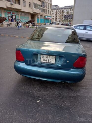 Kia  1999, 400,000 km - 1.8 l - Bakı