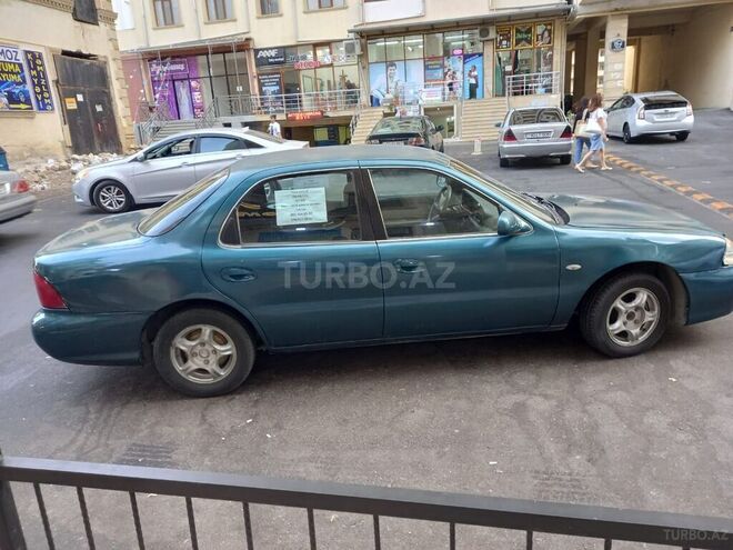 Kia  1999, 400,000 km - 1.8 l - Bakı