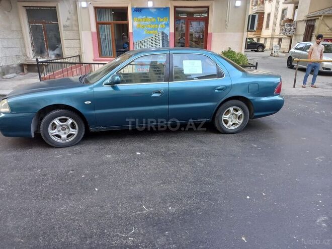 Kia  1999, 400,000 km - 1.8 l - Bakı
