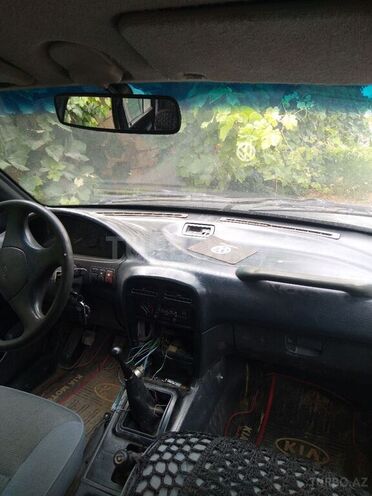 Kia Sportage 1996, 300,886 km - 2.0 л - Quba
