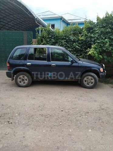 Kia Sportage 1996, 300,886 km - 2.0 л - Quba