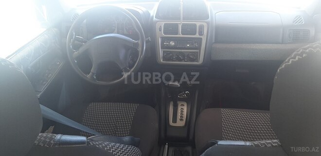 Mitsubishi Pajero io 1998, 128,000 km - 1.8 l - Bakı