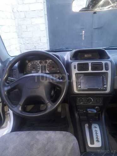 Mitsubishi Pajero io 2002, 292,000 km - 2.0 l - Bakı