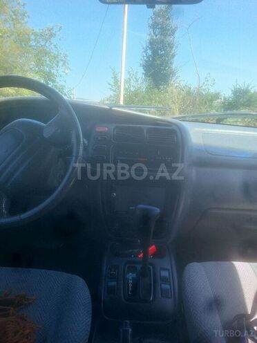 Suzuki Grand Vitara 1999, 226,531 km - 2.5 l - Quba