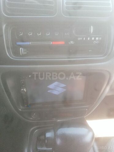 Suzuki Grand Vitara 1999, 226,531 km - 2.5 l - Quba