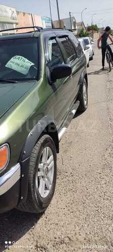 Nissan Pathfinder 1998, 304,000 km - 3.3 l - Qusar