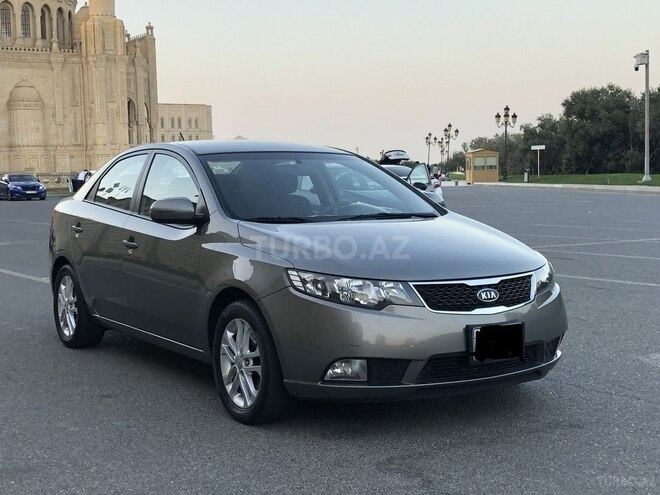 Kia Cerato 2010, 183,000 km - 1.6 l - Qax