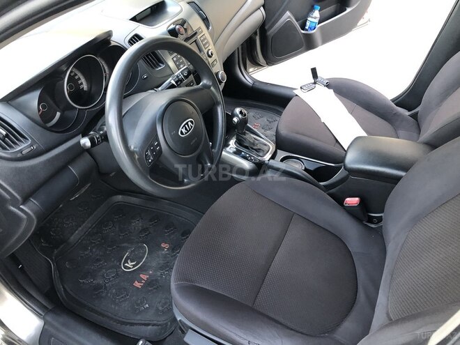 Kia Cerato 2010, 183,000 km - 1.6 l - Qax