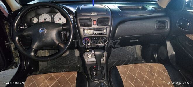 Nissan Sunny 2007, 266,000 km - 1.3 l - Qax