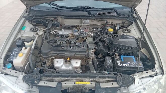 Nissan Sunny 2004, 402,020 km - 1.3 l - Bakı