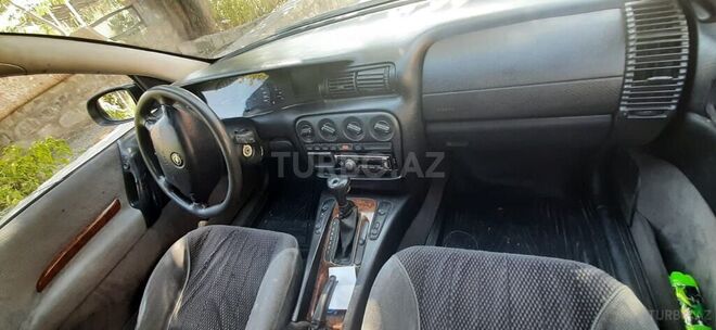 Opel Omega 1996, 350,000 km - 2.0 l - Qax