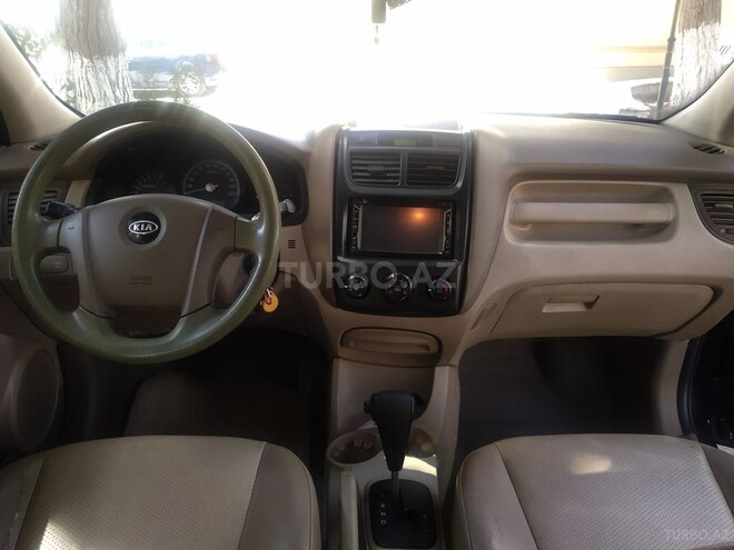 Kia Sportage 2009, 252,000 km - 2.0 l - Bakı
