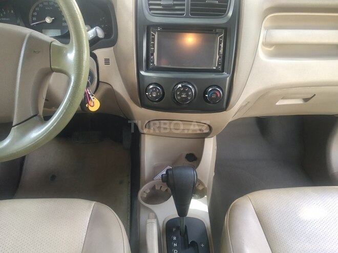 Kia Sportage 2009, 252,000 km - 2.0 l - Bakı