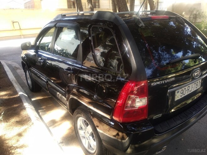 Kia Sportage 2009, 252,000 km - 2.0 l - Bakı
