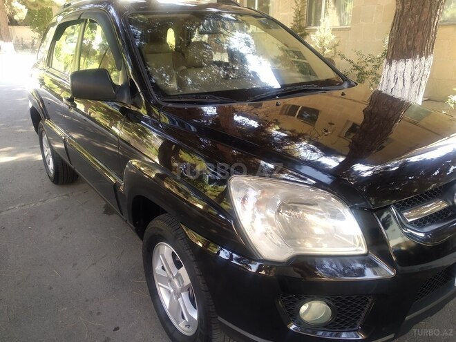 Kia Sportage 2009, 252,000 km - 2.0 l - Bakı