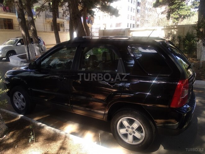 Kia Sportage 2009, 252,000 km - 2.0 l - Bakı