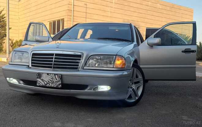 Mercedes C 230 1999, 242,000 km - 2.3 л - Qax