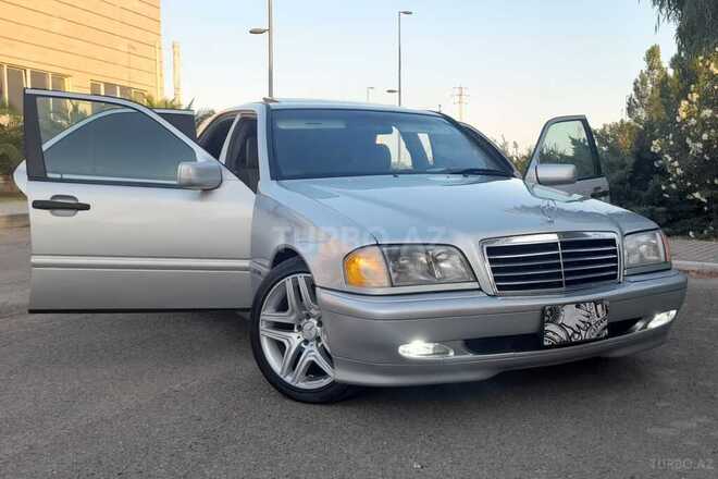 Mercedes C 230 1999, 242,000 km - 2.3 л - Qax