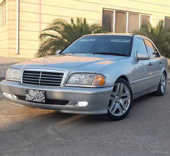 Mercedes C 230 1999, 242,000 km - 2.3 л - Qax