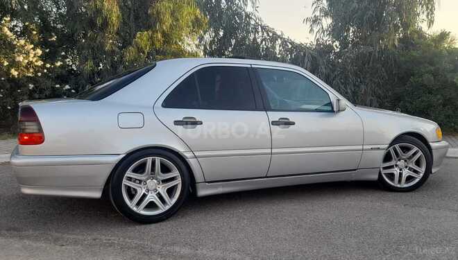 Mercedes C 230 1999, 242,000 km - 2.3 л - Qax