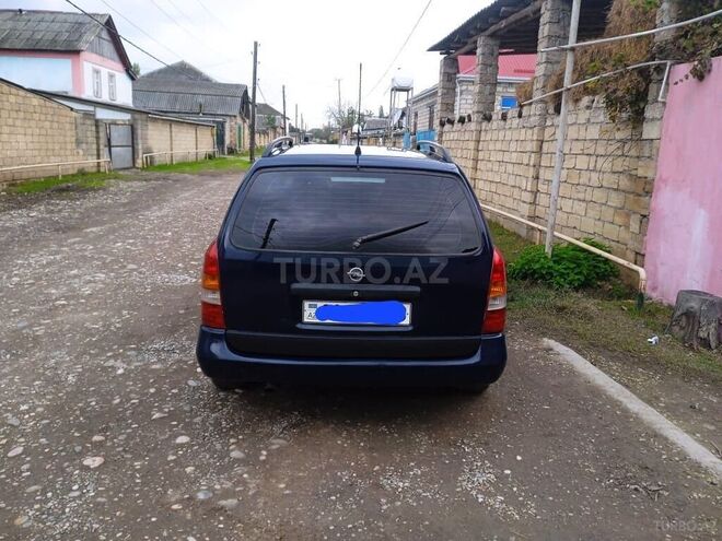 Opel Astra 1999, 450,000 km - 1.8 l - Qusar