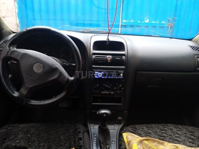 Opel Astra 1999, 450,000 km - 1.8 l - Qusar