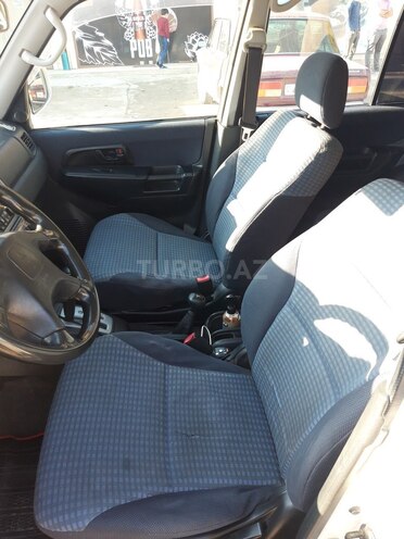 Mitsubishi Pajero io 2000, 350,000 km - 2.0 l - Quba