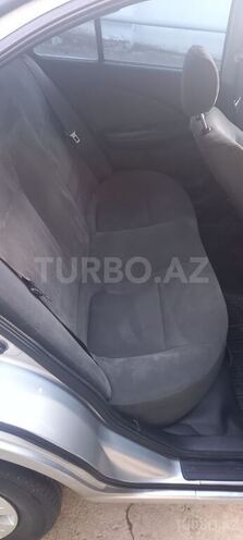 Nissan Sunny 2004, 302,623 km - 1.6 l - Bakı