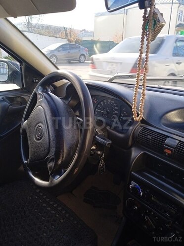 Opel Astra 1997, 260,000 km - 1.6 l - Quba