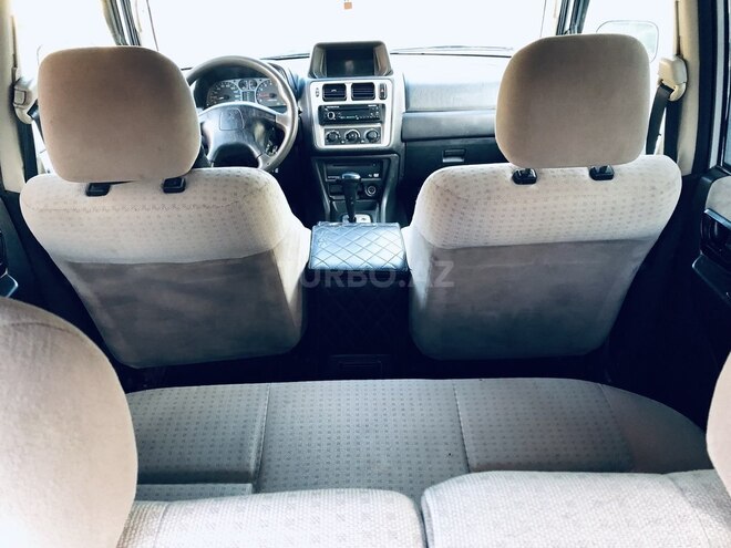 Mitsubishi Pajero io 2001, 141,041 km - 2.0 л - Qax