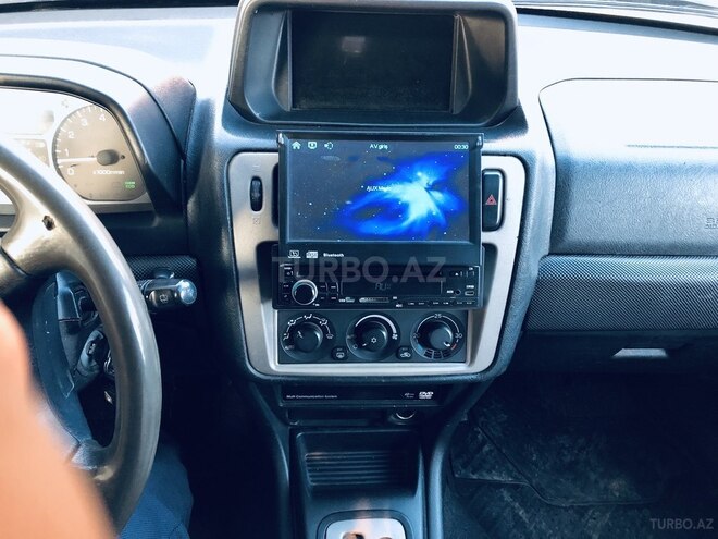 Mitsubishi Pajero io 2001, 141,041 km - 2.0 л - Qax