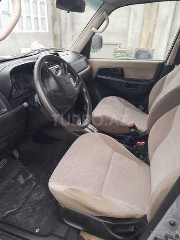 Mitsubishi Pajero io 2004, 197,570 km - 2.0 л - Bakı