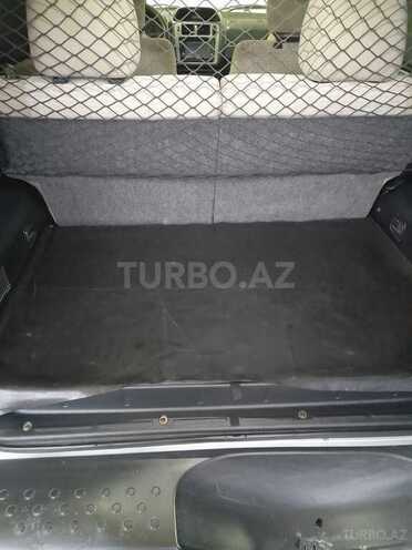 Mitsubishi Pajero io 2004, 197,570 km - 2.0 л - Bakı