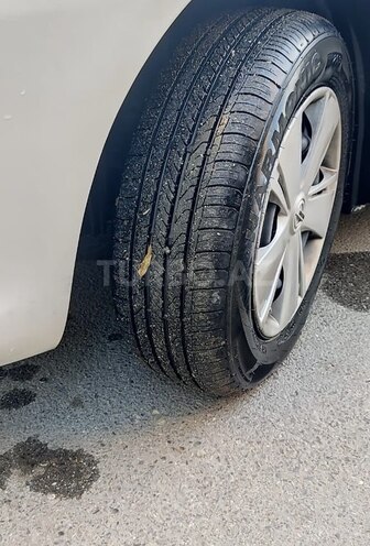 Nissan Sunny 2015, 240,000 km - 1.2 l - Bakı