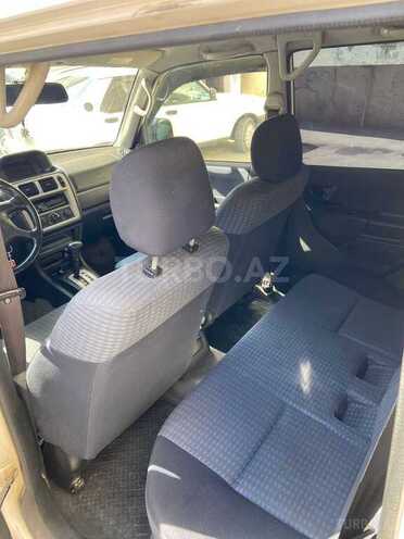 Mitsubishi Pajero io 1999, 320,000 km - 1.8 l - Bakı