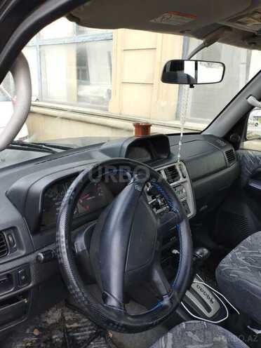 Mitsubishi Pajero io 1999, 400,000 km - 1.8 l - Bakı