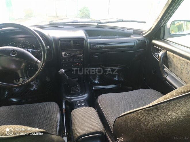 GAZ 31105 2005, 124,000 km - 2.4 л - Quba