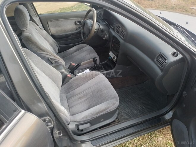 Kia Clarus 1997, 213,256 km - 1.8 l - Bakı