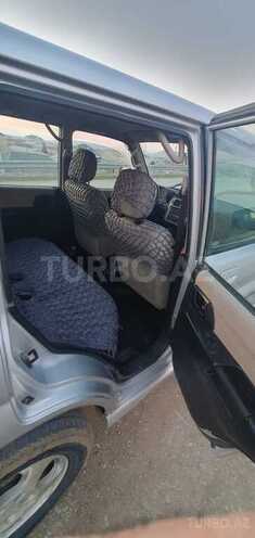 Mitsubishi Pajero io 2002, 290,000 km - 2.0 l - Bakı