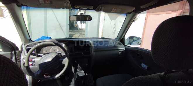 Suzuki Grand Vitara 1999, 226,899 km - 2.5 l - Quba