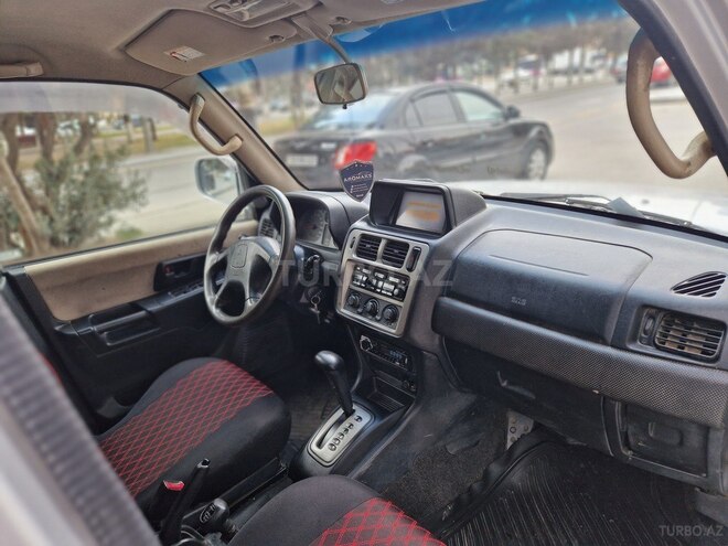 Mitsubishi Pajero io 2002, 295,000 km - 2.0 л - Sumqayıt