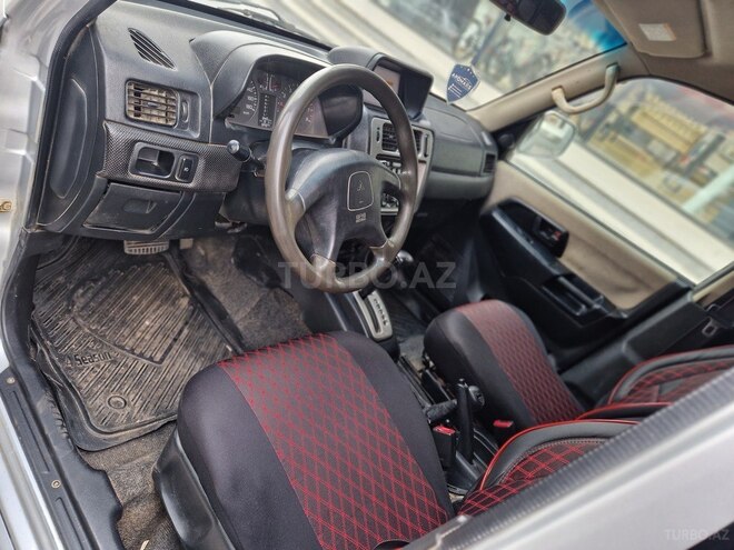 Mitsubishi Pajero io 2002, 295,000 km - 2.0 л - Sumqayıt
