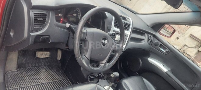 Kia Sportage 2009, 148,000 km - 2.0 l - Bakı