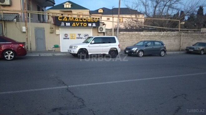 Mitsubishi Pajero io 1999, 250,000 km - 1.8 l - Bakı