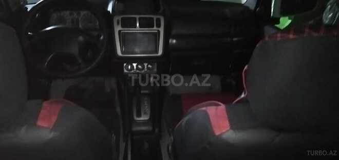 Mitsubishi Pajero io 1999, 250,000 km - 1.8 l - Bakı
